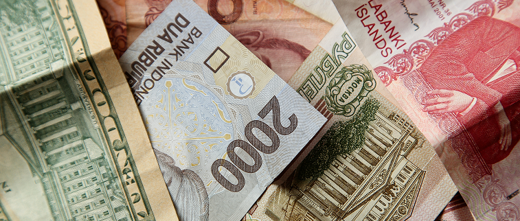 high-angle-closeup-shot-pile-banknotes-wooden-surface-1